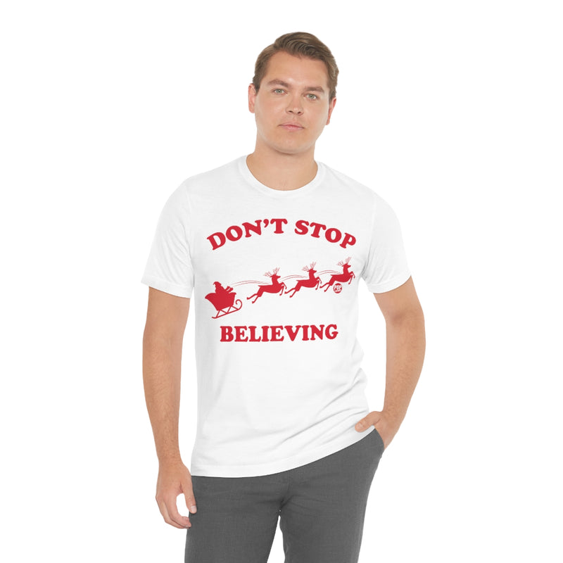 Load image into Gallery viewer, Don&#39;t Stop Believing Santa Unisex Tee
