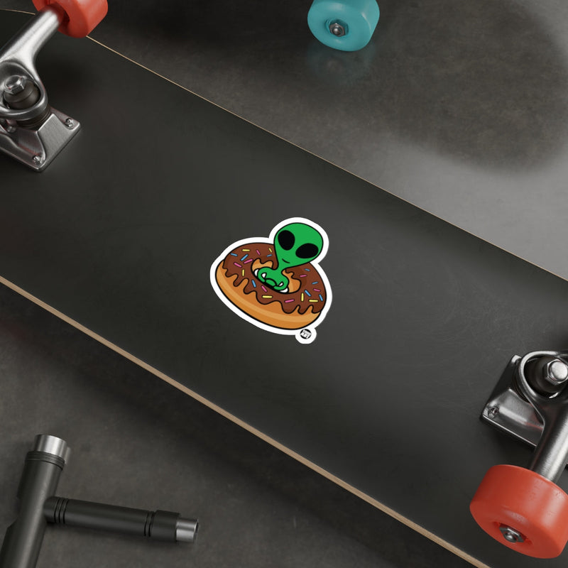 Load image into Gallery viewer, Alien in Donut with Sprinkles Sticker for Your Gear
