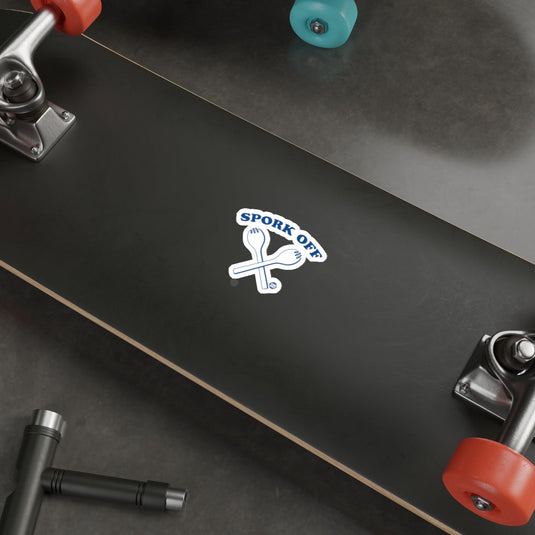 Spork Off Sticker on Black Skateboard Deck