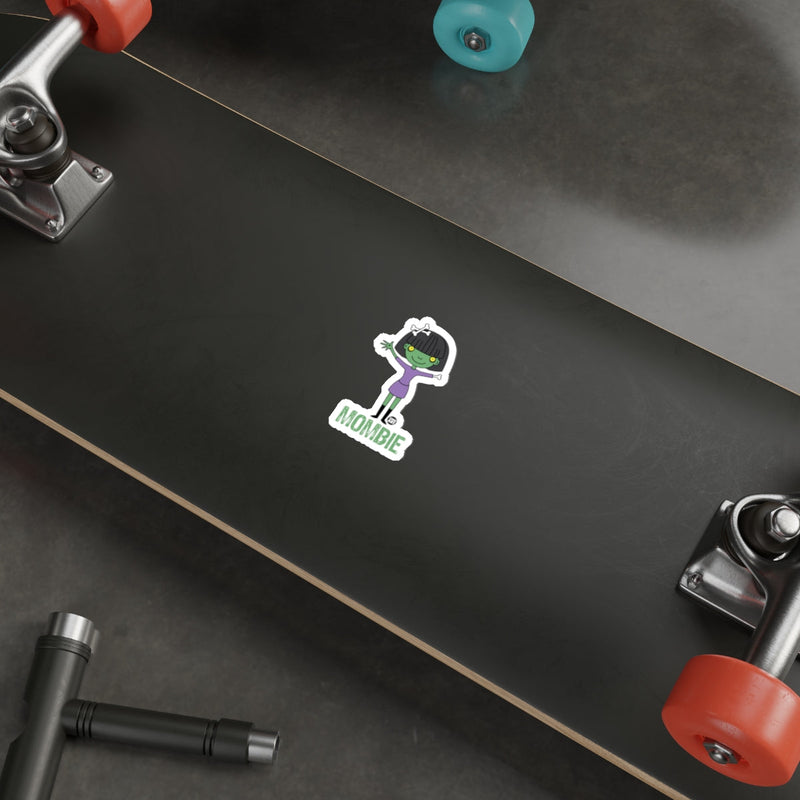 Load image into Gallery viewer, Nombie Character Sticker on Black Skateboard Deck Product
