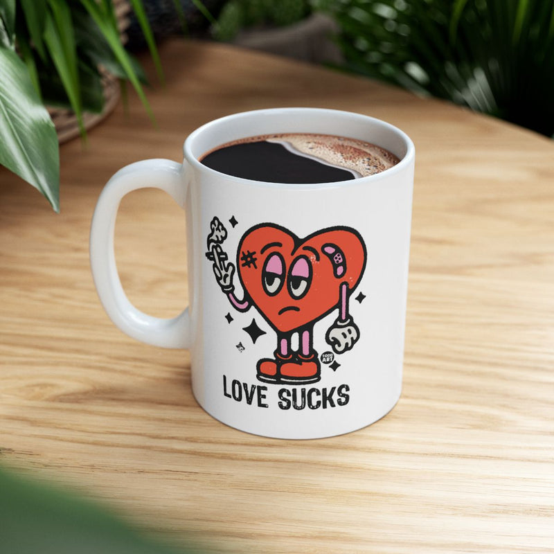 Load image into Gallery viewer, Love Sucks Heart Character Design Mug
