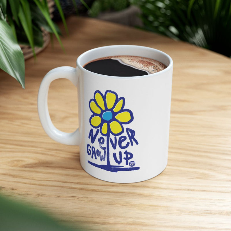 Load image into Gallery viewer, Never Grow Up Yellow and Blue Flower Mug
