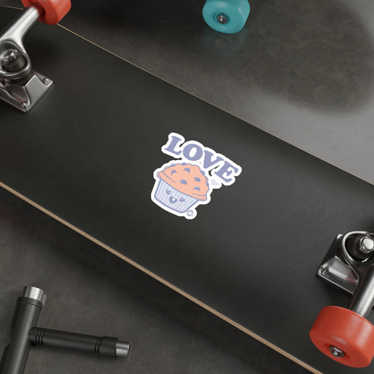 Graphic Skateboard with 'Love' Cupcake Sticker Design