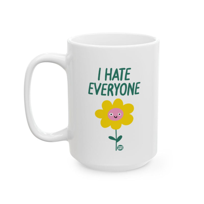 Load image into Gallery viewer, White ceramic mug featuring a smiling flower illustration with the words ‚ÄúI Hate Everyone,‚Äù designed by Todd Art
