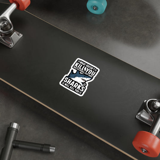 WHAT DOESNT KILL YOU EXCEPT SHARKS sticker 