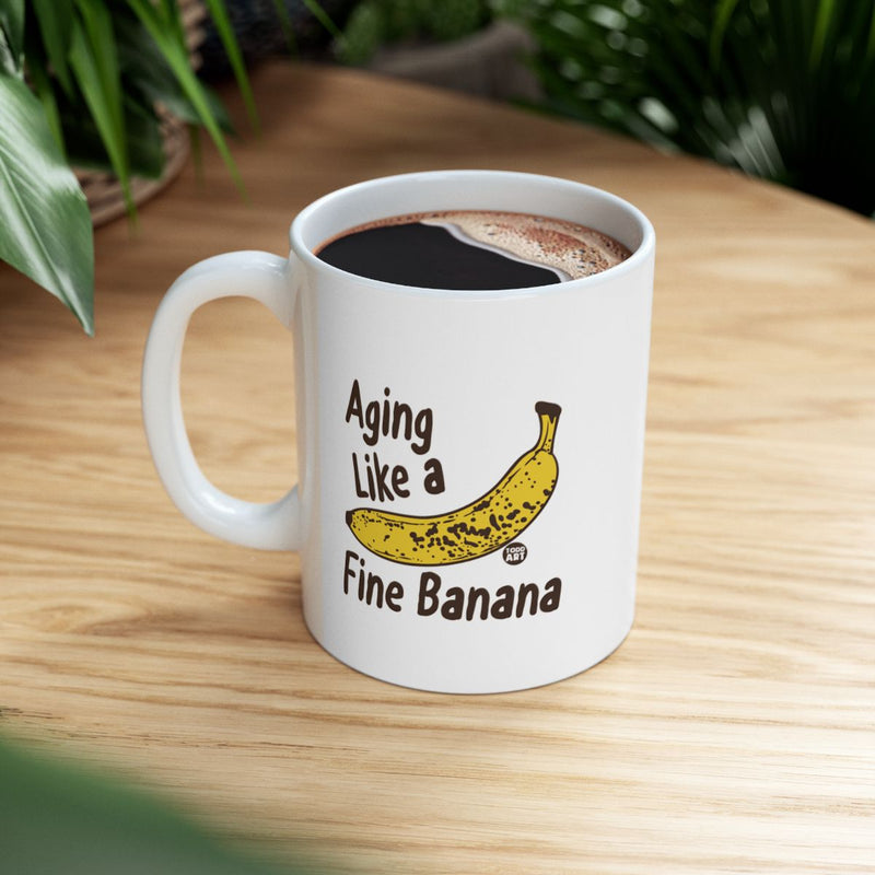 Load image into Gallery viewer, Aging Like a Fine Banana Mug with Funny Banana Illustration
