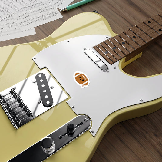 Yellow Electric Guitar with Whammy and Football Sticker