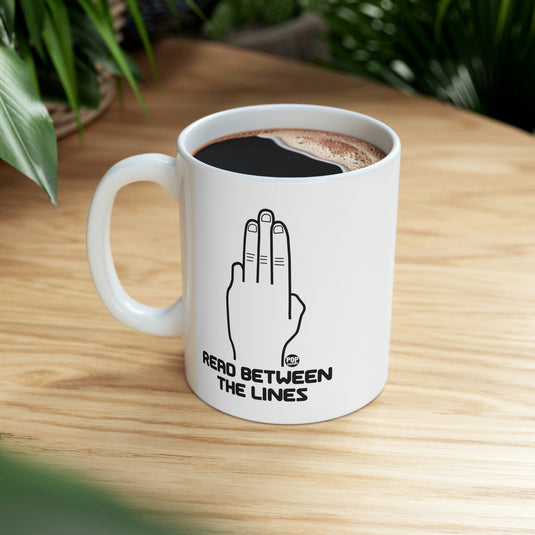 Read Between The Lines Coffee Mug